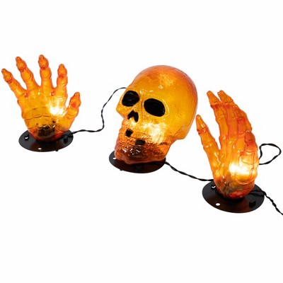  Northlight LED Lighted Skull And Hands Outdoor Halloween Decoration - 4' Black Wire - Orange